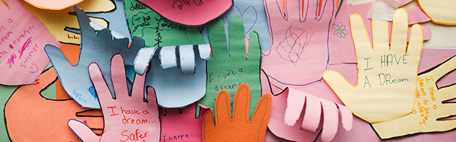 paper cutout hand craft with children's dreams written on them